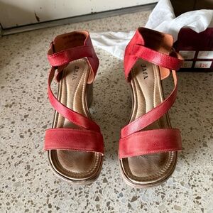 The Jafa 3-Strap Ankle Wedge Sandal in Red. Leather uppers